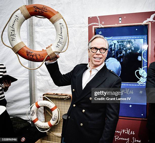 Designer Tommy Hilfiger poses backstage at the Tommy Hilfiger Women's Fall 2016 show during New York Fashion Week: The Shows at Park Avenue Armory on...