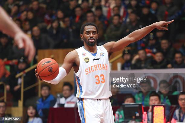 Mike Harris of Sichuan Blue Whales drives the ball during the Chinese Basketball Association 15/16 season play-off quarter-final match between...