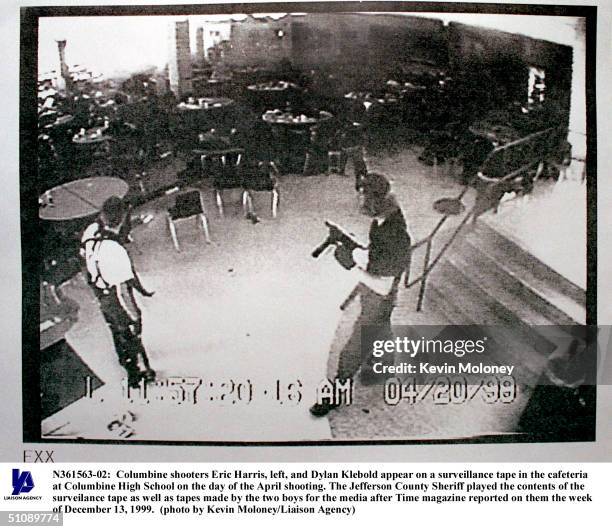 Columbine Shooters Eric Harris, Left, And Dylan Klebold Appear On A Surveillance Tape In The Cafeteria At Columbine High School On The Day Of The...
