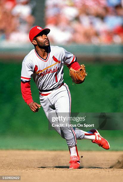 Ozzie Smith of the St. Louis Cardinals reacts to a pop-up against the Chicago Cubs during a Major League baseball game circa 1989 at Wrigley Field in...