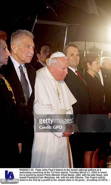 Pope John Paul Ii Listens To The Israeli National Anthem At A Welcoming Ceremony At The Tel Aviv Airport, Tuesday March 21, 2000 In Israel. He Is...