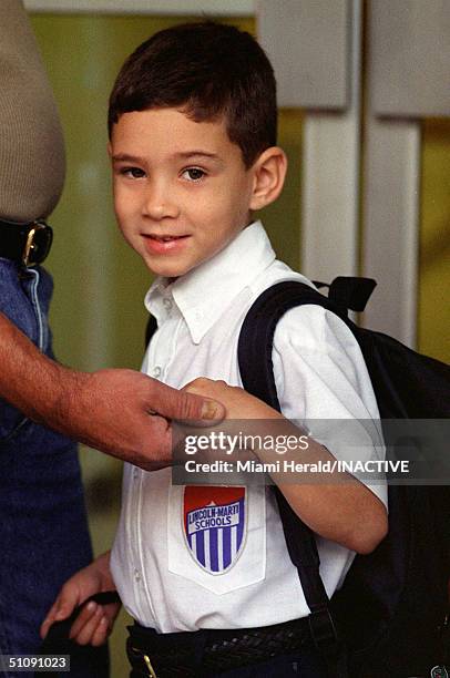 File Photo: Elian Gonzalez Is Brought To His First Day Of Class At The Lincoln-Marti School By His Great-Uncle Lazaro Gonzalez, Left, In Miami, Fl.,...