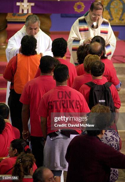 April 10, 2000 Los Angeles, California - Striking Janitors Receive Communion During A Mass Led By Cardinal Roger Mahony For Striking Janitors At Our...