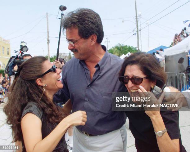 Ramon Saul Sanchez Of The Democracy Movement, Center, Accompanied By Two Unidentified Women April 19, 2000 Celebrate The Ruling In The Elian Gonzalez...