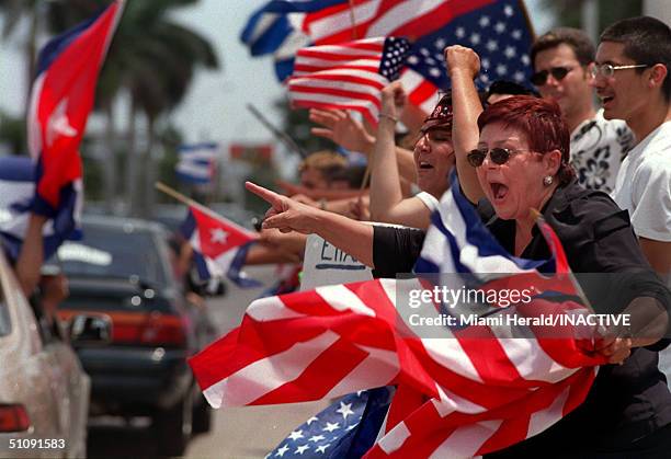 Demonstrators Yell At Passing Cars As They Protest On 49Th Street And West 12Th Ave. In Hialeah, Fl., April 25, 2000. Several Area Businesses Staged...