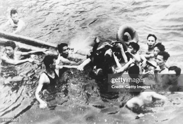 Senator John Mccain Is Pulled Out Of A Hanoi Lake By North Vietnamese Army Soldiers And Civilians October 26, 1967 In Hanoi, North Vietnam. Mccain's...