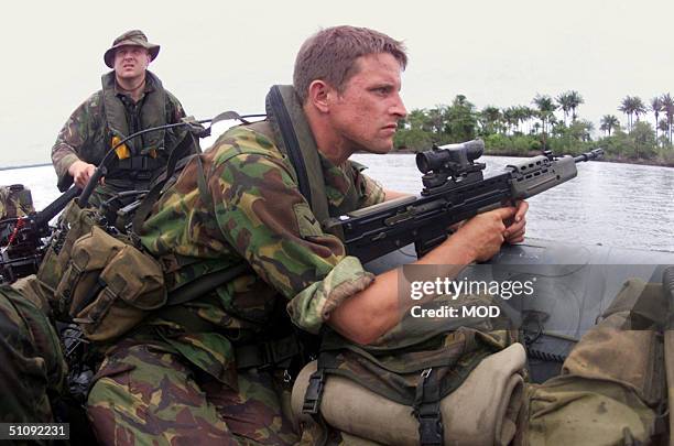 Lance Corporal Lee Graham From Hereford Serving With 1St Battalion The Parachute Regiment Scans The Coastline As He And His Section Approaches...