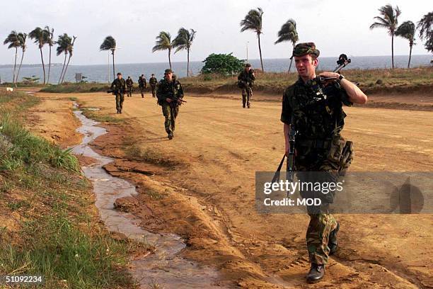 British Army Soldiers From The 1St Battalion Of The Parachute Regiment Patrol Along The United Nations Compound In Freetown, Sierra Leone May 9,...