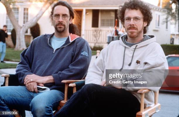 Directors And Producers Joel Coen, Left, And Ethan Coen Pause For A Photograph On The Set Of Their Film, "Blood Simple" June 23, 2000 In Hollywood....