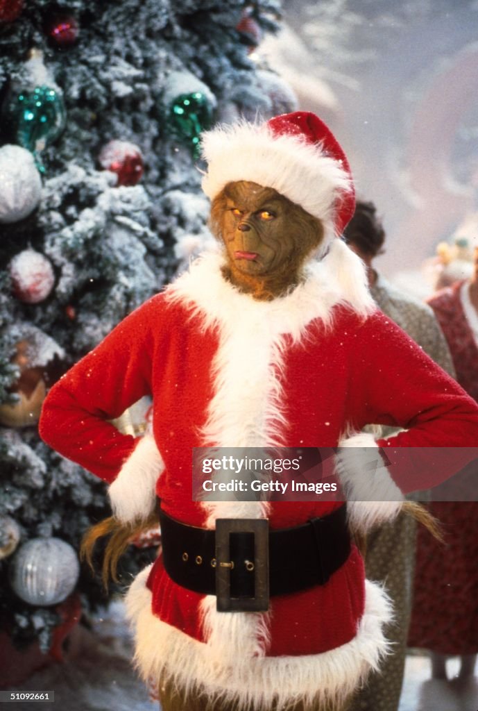 Jim Carrey Stars As The Grinch The Green Monster Who Disguises Himself As Santa Claus An