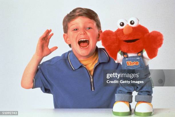 Fisher-Price Sesame Street's Let's Pretend Elmo Can Talk, Pretending To Be Five Different Things. Posable In Five Different Positions, Kids Can...