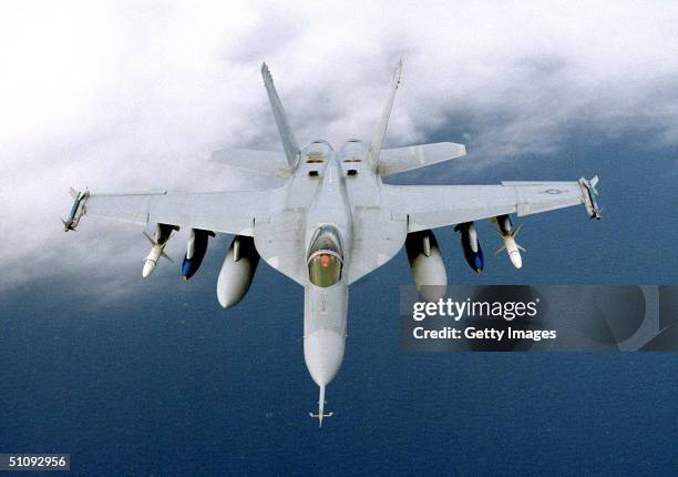 The F/A-18E Super Hornet, The U.S. Navy's Newest Strike-Fighter Aircraft, Flies Above The Ocean February 21, 1997 While Conducting Its First...