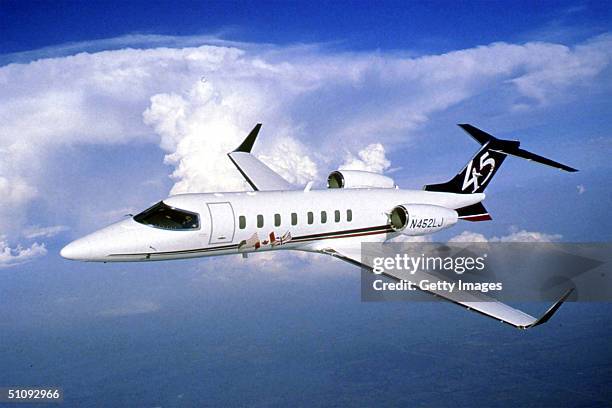 Undated File Photo: A Learjet 45 In Flight. A Learjet Flew Uncontrolled Over The Nation's Heartland For Hours October 25, 1999 Before Crashing In...