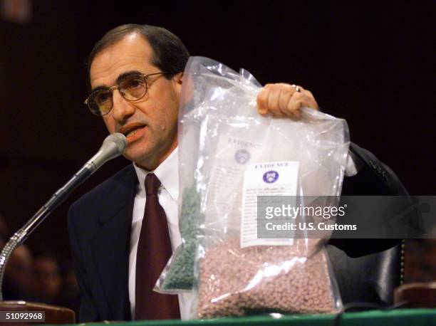 Undated File Photo: Acting Commissioner Of Customs Charles Winwood Holds Up Bags Of Ecstacy While Addressing The Members Of The Senate Caucus For...