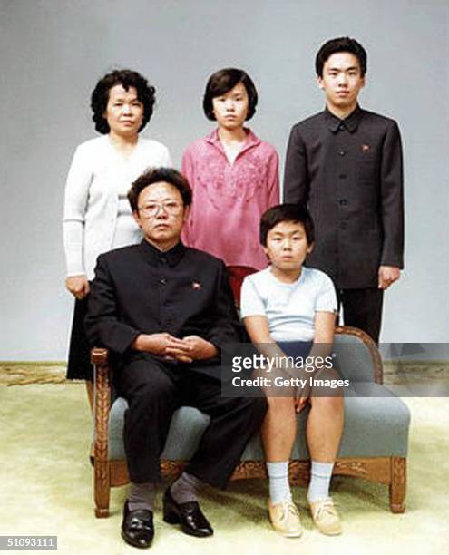 North Korean leader Kim Jong-Il with family members, 19th August 1981. Front: Kim Jong-Il and his son, Jong-Nam. Back: Kim Jong Il's sister-in-law,...