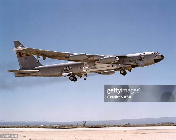 The First X-43A Hypersonic Research Aircraft And Its Modified Pegasus Booster Rocket Are Carried Aloft By Nasa's Nb-52B Carrier Aircraft June 2, 2001...