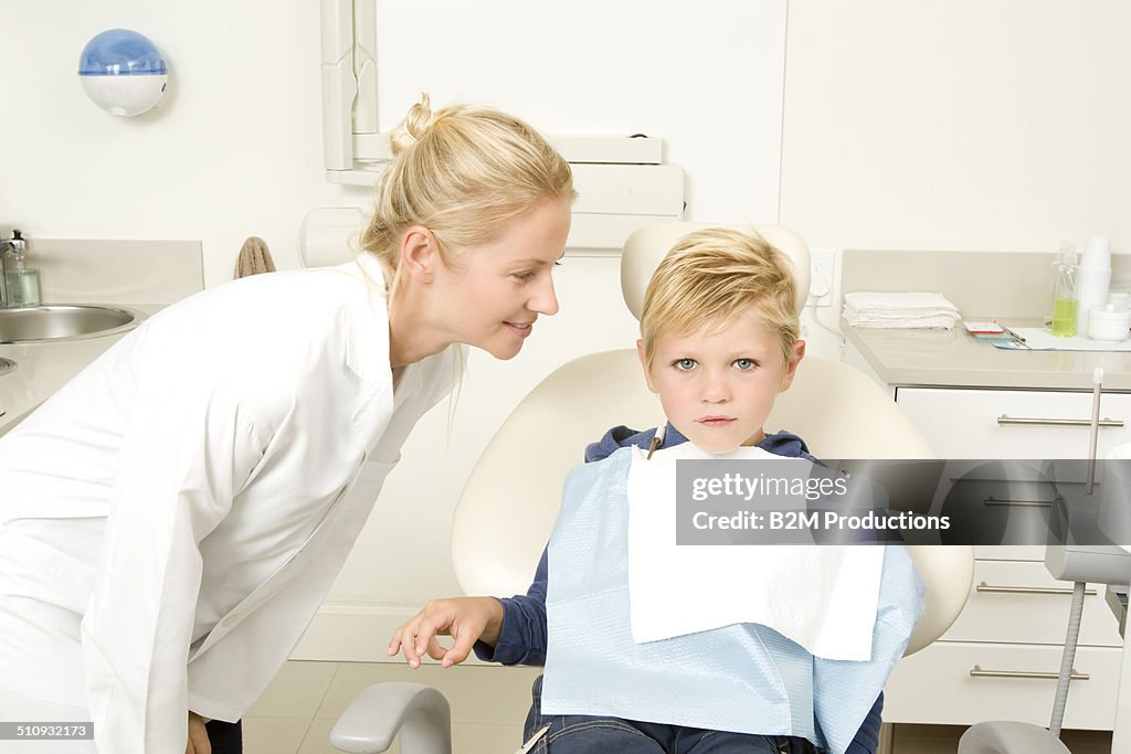 Dentist in examination room