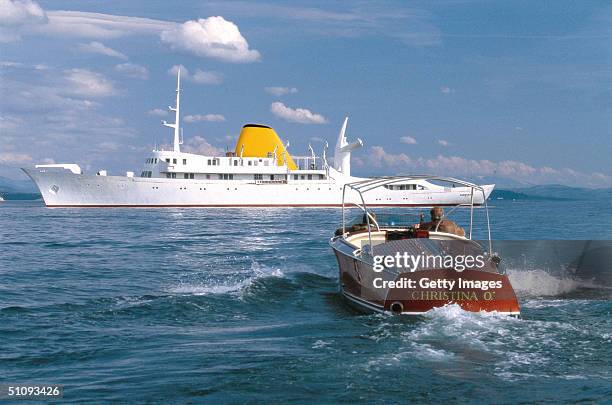 The Newly Restored Christina O, Former Private Yacht Of Aristotle Onassis, And Her Tender Cruise At Sea April 24, 2001 In The Mediterranean. The...