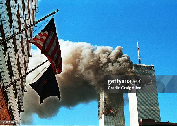 Smoke Pours From The World Trade Center After Being Hit By Two Planes September 11, 2001 In New York City.