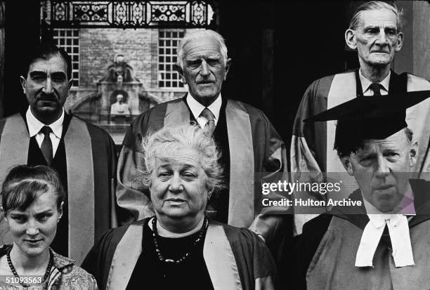 Russian poet and author Anna Akhmatova , front row center, sits between her niece and Australian-born Vice Chancellor of Oxford University Dr Kenneth...