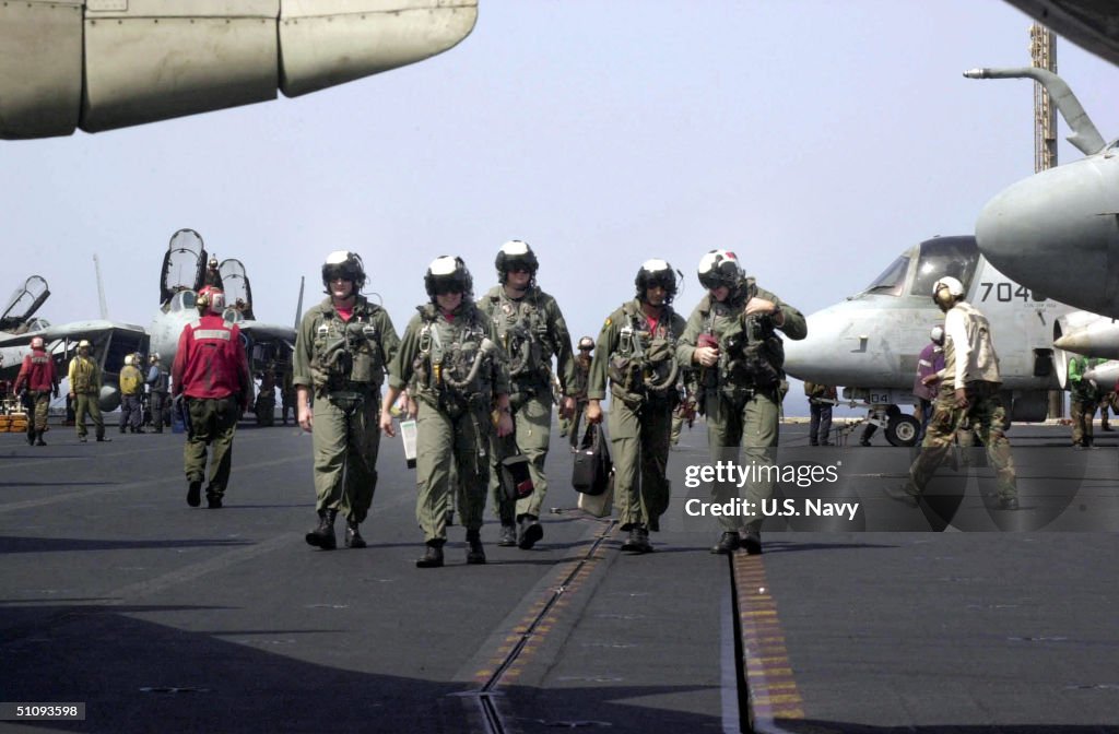 The Crew Of A U S Navy E 2C Hawkeye Return From A Mission In Support Of Operation End