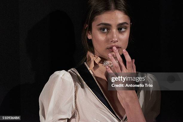 Model poses backstage at the Tommy Hilfiger Women's Fall 2016 show during New York Fashion Week: The Shows at Park Avenue Armory on February 15, 2016...