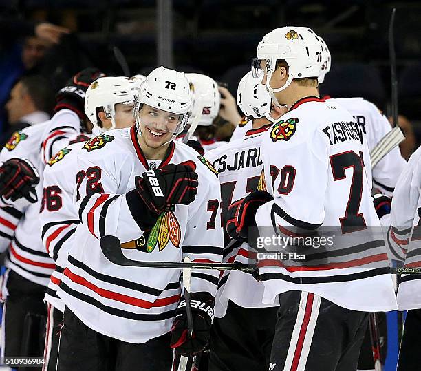 Artemi Panarin of the Chicago Blackhawks celebrates with teammates after the game against the New York Rangers at Madison Square Garden on February...