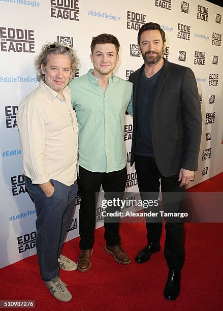 Dexter Fletcher, Taron Egerton and Hugh Jackman are seen arriving at the premiere of the film "Eddie the Eagle" at Regal South Beach on February 17,...