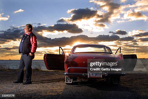 Irv Gordon Stands Next To His 1966 Volvo P1800 In This Undated Photo. Gordon Was Honored For Driving The Car Two Million Miles.