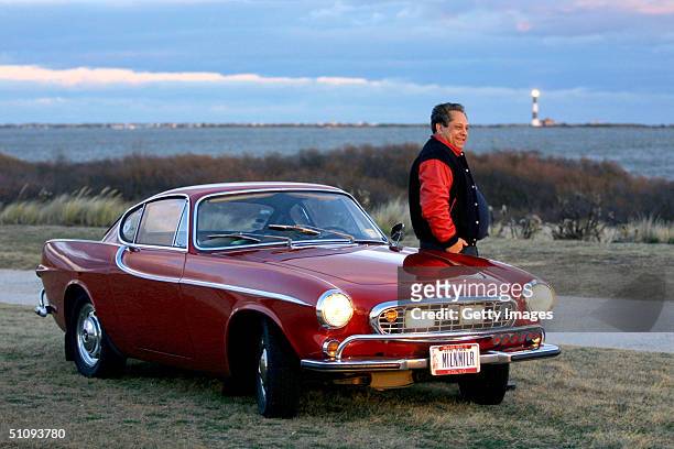 Irv Gordon Stands Next To His 1966 Volvo P1800 In This Undated Photo. Gordon Was Honored For Driving The Car Two Million Miles.