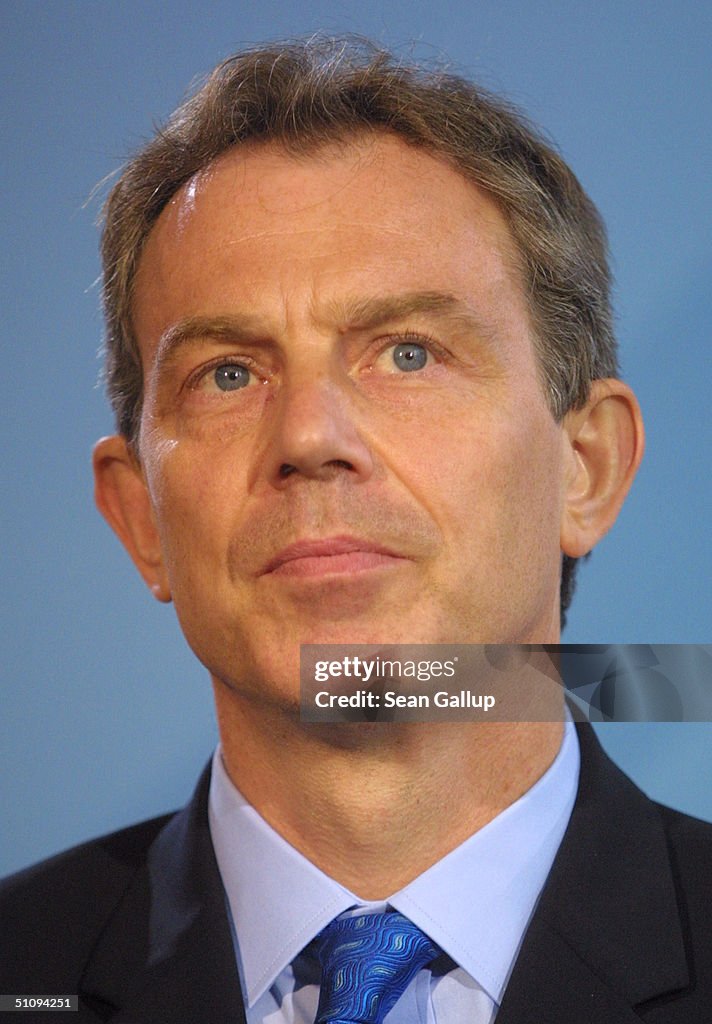 British Prime Minister Tony Blair Listens To A Reporter's Question