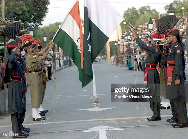 Soldiers From India And Pakistan Perform The Elaborate Daily Flag-Lowering Ceremony May 30, 2002 At The Wagah Border Post Near The Pakistani City Of...