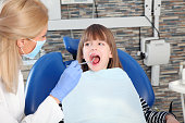Dentis and little patient