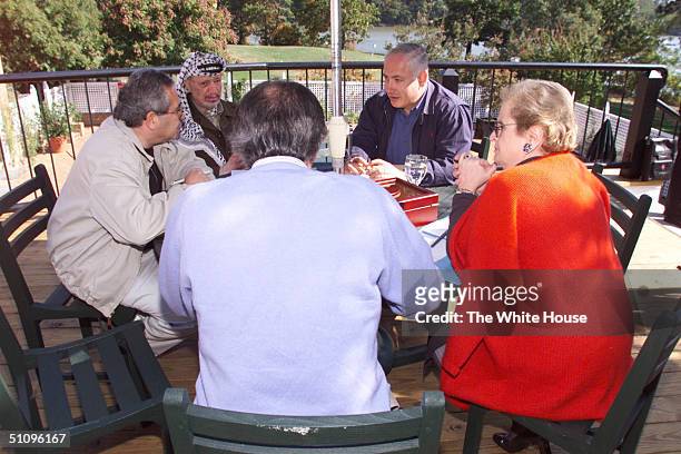 Secretary Of State Madeleine Albright Meets With Prime Minister Benjamin Netanyahu And Yasir Arafat For A Working Lunch At River House, Wye River...