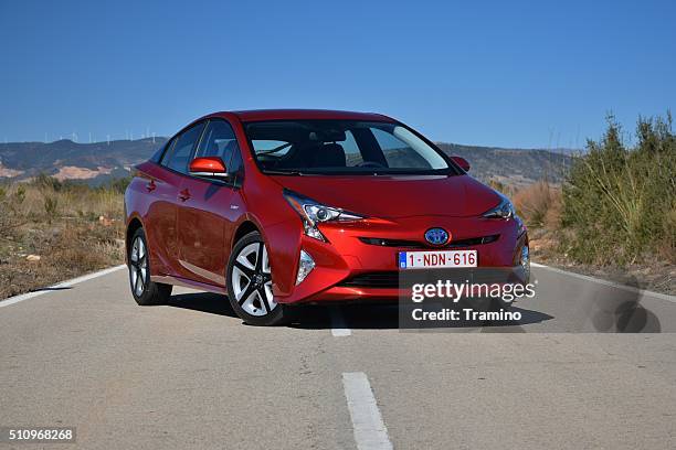 toyota prius on the road - toyota prius stock pictures, royalty-free photos & images