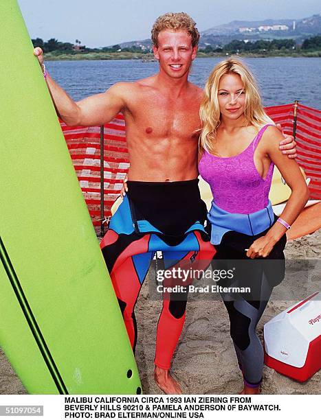 Malibu Circa Pamela Anderson From Tv Series Bay Watch And Ian Ziering From Beverly Hills 90210. Ian Is Giving Pamela Her First Surf Lesson