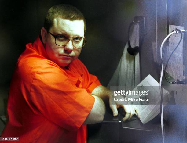 An Unidentified Inmate Reads In His Cell On Death Row At The Arizona State Prison Complex In Florence, Some 80 Miles Southeast Of Phoenix On February...