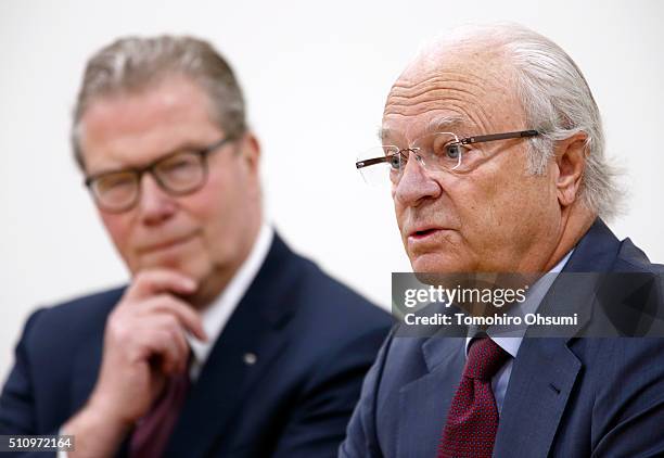 King Carl XVI Gustaf of Sweden, right, speaks as Swedish Academy of Engineering Sciences Chairman Leif Johansson looks on during a press conference...