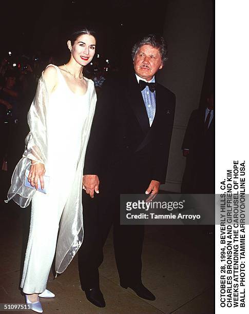 October 28 Beverly Hills, Ca. Charles Bronson & Girlfriend Kim Weeks Arrives At The Carsouel Ball Held At The Beverly Hilton Hotel.