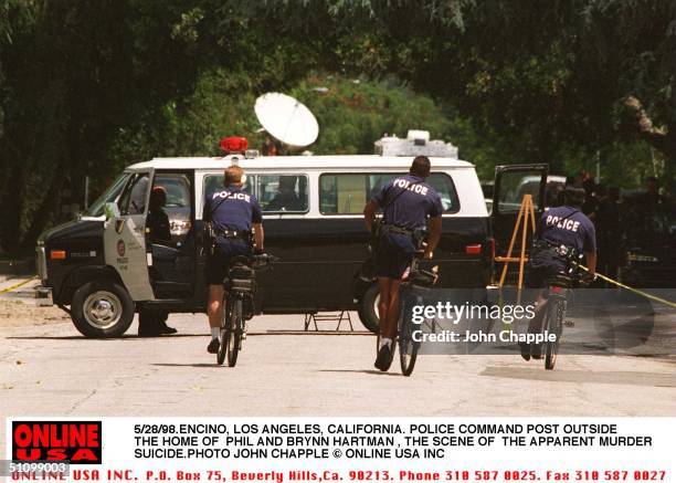 Encino, Los Angeles, California. A Police Command Post Out Side The Home Of Phil And Brynn Hartman Who Where Killed In An Apparent Murder Suicide