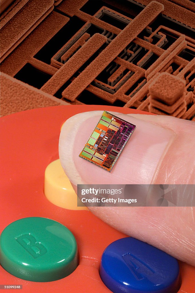 Powerpc Processor Chip An Ibm Powerpc Copper Processor Chip On Thumbnail With A Nintendo ...