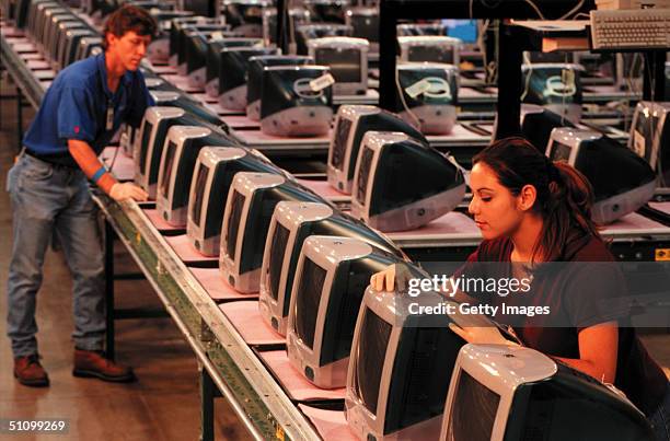 An Apple Employee Works On An Imac Computer At The Apple Manufacturing Plant In Sacramento, Ca.