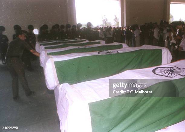 Men From The Indian Army Pay Their Respects To The Six Soldiers Who Were Killed By Pakistani Guerrilla Forces In New Delhi On June 11, 1999. India...