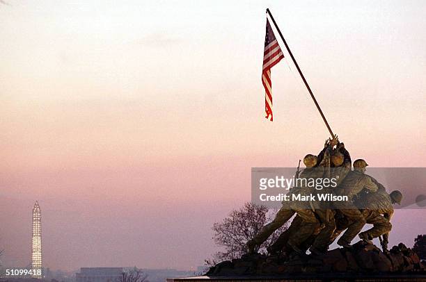 The Sun Rises Over The Iwo Jima Memorial In Arlington Virginia, November 10, 1999. Today Marks The 224Th Birthday Of The United States Marine Corps.