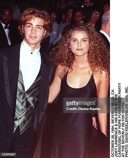 Actors Joey Lawrence and Keri Russell attend the Carousel of Hope Ball October 28, 1994 in Los Angeles, CA. The event will raise money to help fund...