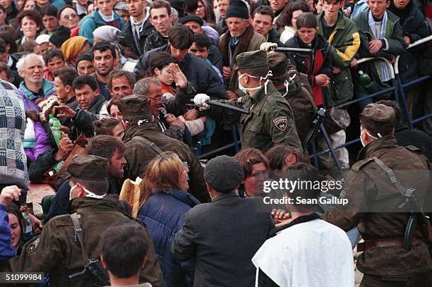 Macedonian Police Beat Back Albanian Refugees Seeking To Get To Waiting Buses At Blace, Macedonia, April 6 At The Border With Kosovo, Where An...