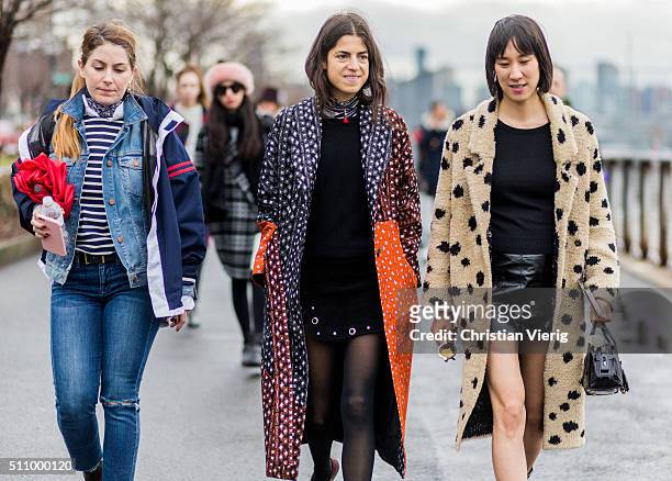 Leandra Medine and Eva Chen wearing a Thakoon coat seen outside Coach during New York Fashion Week: Women's Fall/Winter 2016 on February 16, 2016 in...