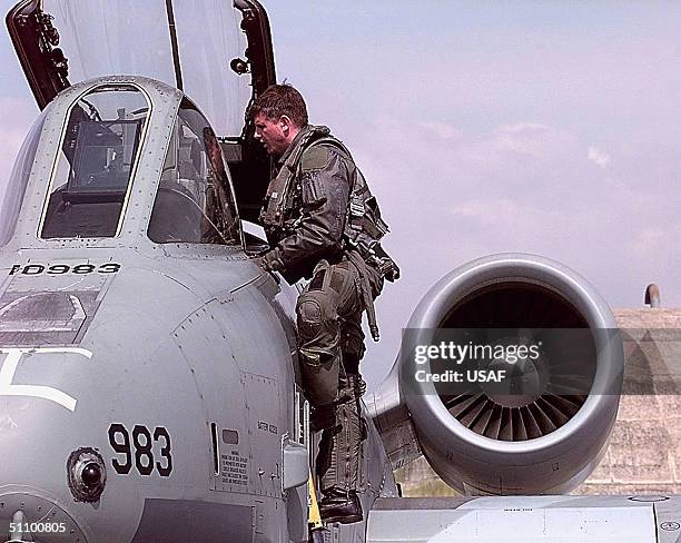 An A-10 Thunderbolt Pilot, From The 81St Fighter Squadron, Spangdahlem Air Base, Germany, Gets Out Of His Aircraft After Flying Against Targets In...