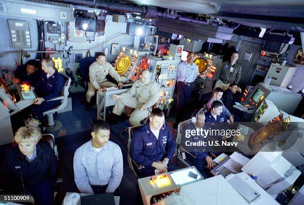 Air Traffic Controllers Monitor Aircraft Launched From The USS Theodore Roosevelt During Strike Operations June 7, 1999. Theodore Roosevelt And Its...