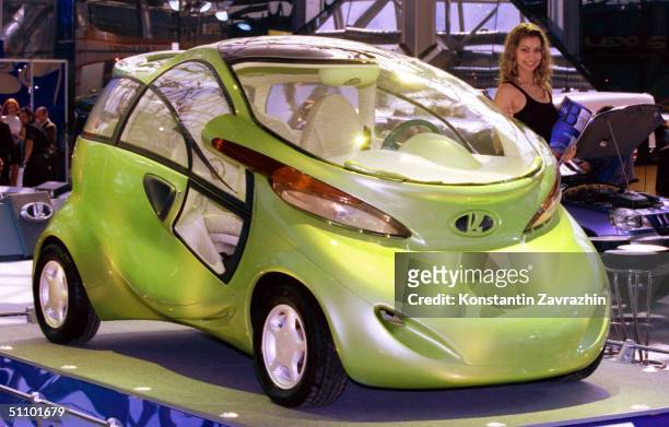 Model Promotes The New Lada-Made Electric Concept Car "Rapan" At The 4Th Russian International Auto Exhibition "Autosalon - 99" In Moscow, Monday,...